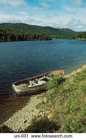 Rowing Boat by Loch Scotland UK View Large Photo Image Stock Image - Rowing Boat by Loch Scotland UK. Fotosearch