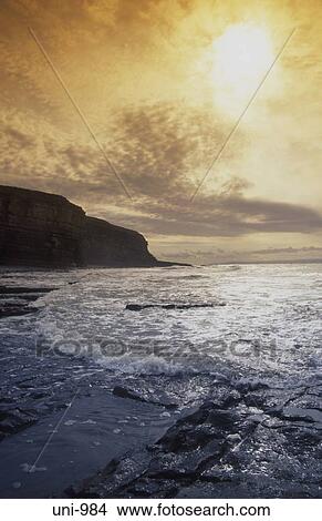 Setting Sun Nash Point Wales UK View Large Photo Image Picture - Setting Sun Nash Point Wales UK. Fotosearch