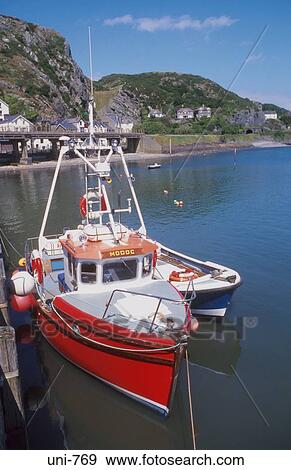 Stock Photo - Small Boats in Harbour Barmouth Wales UK. Fotosearch