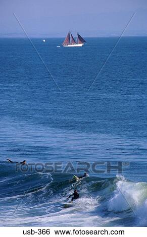 Stock Photograph - Small Sailing Boat on Sea off Santa Cruz USA. Fotosearch