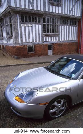 Sports Car outside Medieval Timber Framed Building Lavenham UK View Large Photo Image Picture - Sports Car outside Medieval Timber Framed Building Lavenham UK. Fotosearch