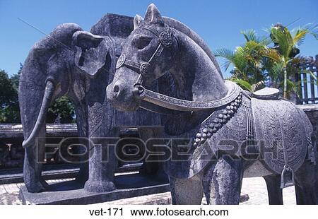 Stock Image - Stone Horse and Elephant Tomb of Khai Dinh Hue Vietnam. Fotosearch