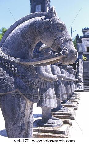 Stock Image - Stone Horse and Soldiers Tomb of Khai Dinh Hue Vietnam. Fotosearch