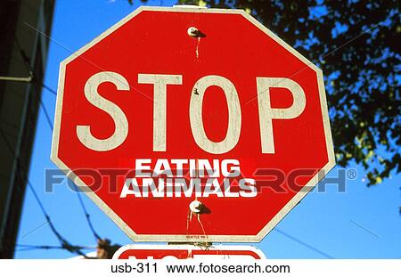 Stock Image - Stop Sign Modified by Vegetarian USA. Fotosearch