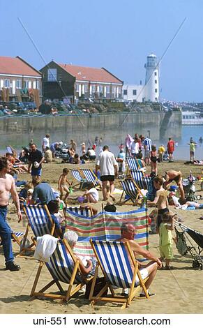 Sunbathers on Scarborough Beach UK View Large Photo Image Stock Image - Sunbathers on Scarborough Beach UK. Fotosearch