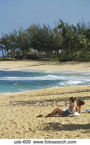Sunbathers on Sunset Beach North Shore Oahu Hawaii USA View Large Photo Image Stock Photo - Sunbathers on Sunset Beach North Shore Oahu Hawaii USA. Fotosearch