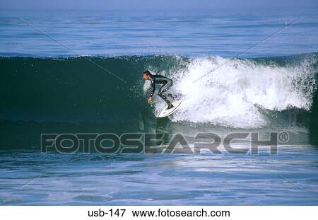 Stock Photo - Surfer in Wetsuit Carmel California USA. Fotosearch