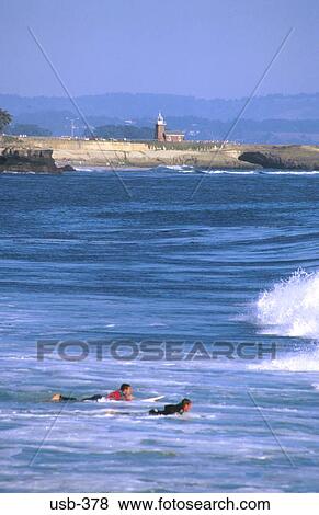 Surfers Paddling to Waves Santa Cruz California USA View Large Photo Image Stock Photo - Surfers Paddling to Waves Santa Cruz California USA. Fotosearch