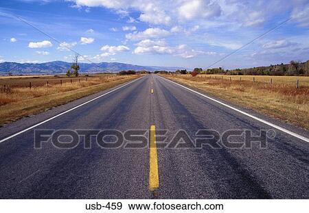 Symmetrical View of Road in Flat Country USA View Large Photo Image Stock Photo - Symmetrical View of Road in Flat Country USA. Fotosearch