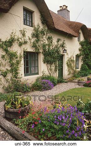 Stock Photography - Thatched Cottage and Garden Wales UK. Fotosearch