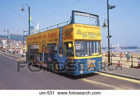 Tour Bus by Beach Scarborough UK View Large Photo Image Stock Image - Tour Bus by Beach Scarborough UK. Fotosearch