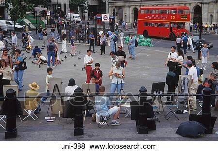 Tourists being Painted Trafalgar Square London UK View Large Photo Image Stock Photo - Tourists being Painted Trafalgar Square London UK. Fotosearch