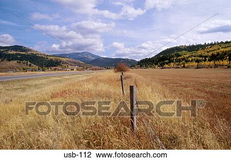 Track and Wire Fence along Valley Floor Idaho USA View Large Photo Image Stock Image - Track and Wire Fence along Valley Floor Idaho USA. Fotosearch