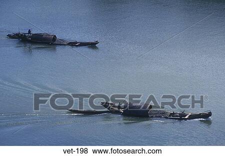 Stock Photo - Traditional Boats on the Perfume River Vietnam. Fotosearch