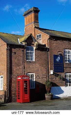 Traditional Red Telephone Box by Pub Wales UK View Large Photo Image Stock Photo - Traditional Red Telephone Box by Pub Wales UK. Fotosearch