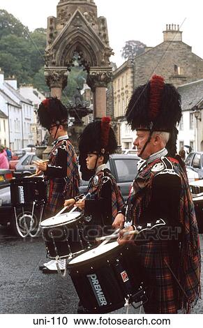 Stock Image - Traditionally Dressed Drummers Scotland. Fotosearch