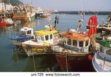Trawlers in Scarborough Old Harbour UK View Large Photo Image Stock Photo - Trawlers in Scarborough Old Harbour UK. Fotosearch