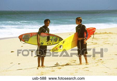 Two Surfers Hawaii USA View Large Photo Image Stock Photo - Two Surfers Hawaii USA. Fotosearch