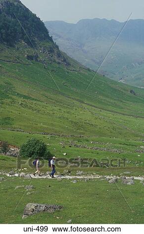 Walkers on Path Lake District UK View Large Photo Image Stock Photo - Walkers on Path Lake District UK. Fotosearch