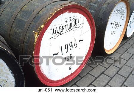 Stock Image - Whisky Maturing in Barrels Scotland. Fotosearch