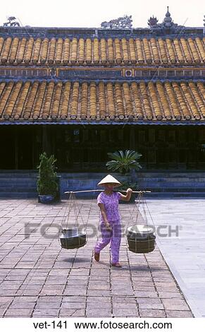 Woman with Yoke Tomb of Tu Duc Vietnam View Large Photo Image Stock Image - Woman with Yoke Tomb of Tu Duc Vietnam. Fotosearch