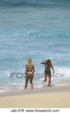 Women in Surf Hawaii USA View Large Photo Image Stock Photo - Women in Surf Hawaii USA. Fotosearch