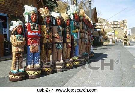 Stock Photo - Wood Statues of American Indians USA. Fotosearch