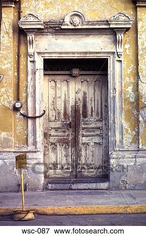 Wooden Door to Yellow Building Mexico View Large Photo Image Stock Photo - Wooden Door to Yellow Building Mexico. Fotosearch