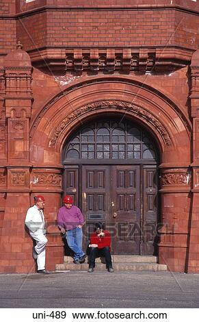 Workman by Brick Doorway Pierhead Building Wales View Large Photo Image Stock Photo - Workman by Brick Doorway Pierhead Building Wales. Fotosearch