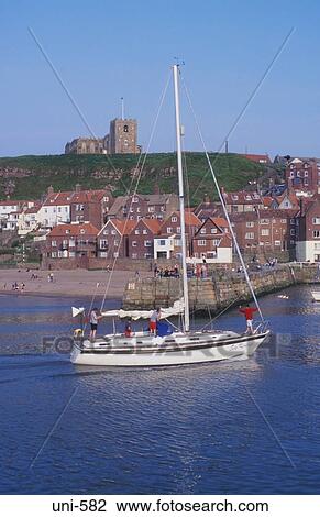 Yacht Entering Whitby Harbour UK View Large Photo Image Stock Image - Yacht Entering Whitby Harbour UK. Fotosearch