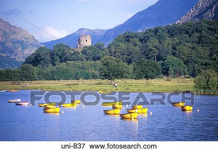 Yellow Boats at Llanberis Snowdonia National Park Wales UK View Large Photo Image Stock Photo - Yellow Boats at Llanberis Snowdonia National Park Wales UK. Fotosearch