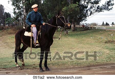 Stock Image - Cordoba, Horseback, Gaucho, Argentina. Fotosearch