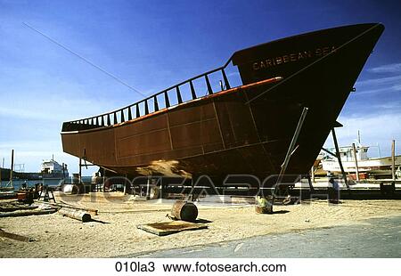 Stock Image - Beach, CONSTRUCTION, BUILDING, BOAT, AMERICA. Fotosearch