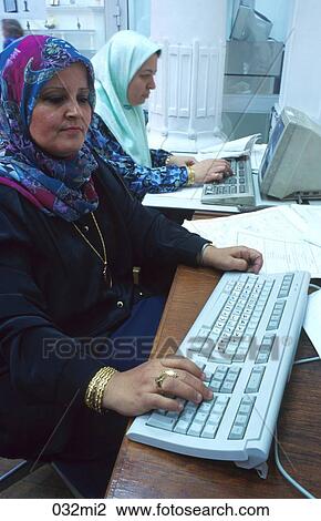 BUSINESS, EGYPT, Dress, Computer, AFRICA View Large Photo Image Stock Image - BUSINESS, EGYPT, Dress, Computer, AFRICA. Fotosearch