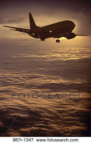 aircraft, clouds, jet, transportation, silhouette, airplane View Large Photo Image Stock Photo - aircraft, clouds, jet, transportation, silhouette, airplane. Fotosearch
