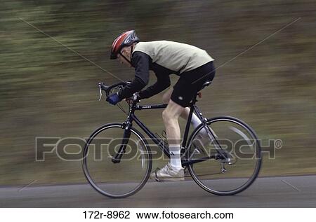 Stock Image - bicycle, riding, motion, sports, speed. Fotosearch