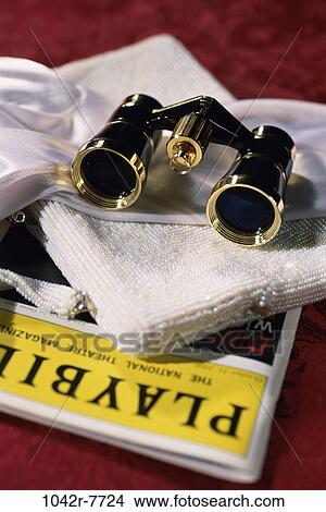 binoculars, magazine, opera, arts, entertainment, purse, still life View Large Photo Image Picture - binoculars, magazine, opera, arts, entertainment, purse, still life. Fotosearch