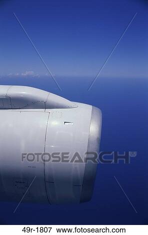 blue sky, transportation, airborne, aircraft, engine, airplane View Large Photo Image Stock Photo - blue sky, transportation, airborne, aircraft, engine, airplane. Fotosearch