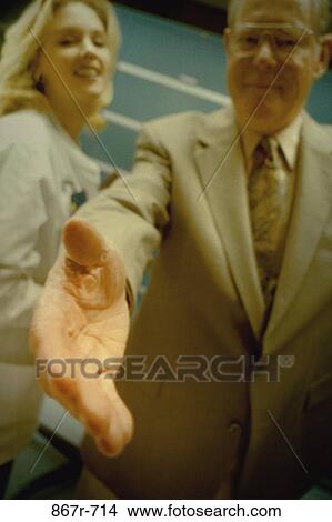 blur, business, Middle-aged, handshake, indoors, Caucasian View Large Photo Image Picture - blur, business, Middle-aged, handshake, indoors, Caucasian. Fotosearch