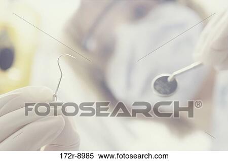 Stock Photography - blur, woman, dentist, health, blond, dentistry. Fotosearch