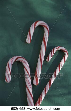 Stock Photo - candy, Christmas, curving, stripes, sweet, striped, food. Fotosearch