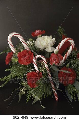 candy, Christmas, flowers, flower arrangement, carnations, still life View Large Photo Image Stock Photo - candy, Christmas, flowers, flower arrangement, carnations, still life. Fotosearch