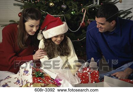 excitement, open, Christmas, family, Christmas tree, gifts View Large Photo Image Stock Image - excitement, open, Christmas, family, Christmas tree, gifts. Fotosearch
