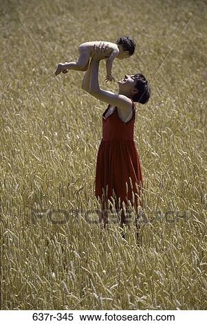 Field, people, playing, mother, Hispanic, baby, playful View Large Photo Image Stock Photography - Field, people, playing, mother, Hispanic, baby, playful. Fotosearch
