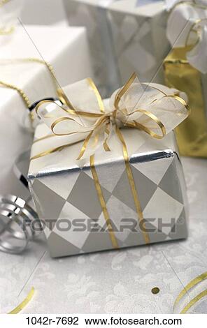 Stock Image - gifts, presents, ribbon, elegant, still life, bow, holiday. Fotosearch