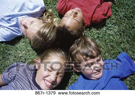 grass, multiethnic, people, ground, outdoors, children View Large Photo Image Stock Photo - grass, multiethnic, people, ground, outdoors, children. Fotosearch