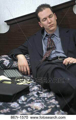 hotel, sleeping, exhaustion, bed, business, tired, brunette View Large Photo Image Stock Image - hotel, sleeping, exhaustion, bed, business, tired, brunette. Fotosearch