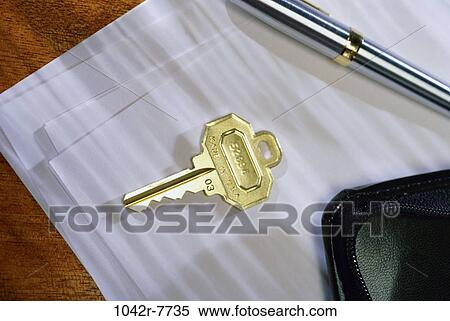 Stock Photography - key, pen, paper, desk, business, finance, still life. Fotosearch