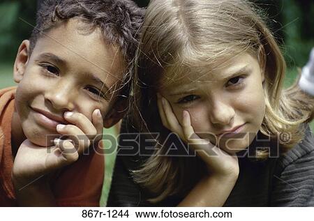 multiethnic, people, outdoors, children, bored, headshot, boredom View Large Photo Image Picture - multiethnic, people, outdoors, children, bored, headshot, boredom. Fotosearch