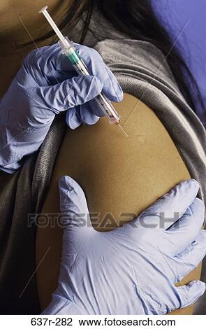 people, arm, needle, syringe, patient, injection, shot View Large Photo Image Stock Image - people, arm, needle, syringe, patient, injection, shot. Fotosearch